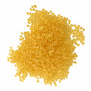 Infinity IM-PA-6208 amber hot melt adhesive pellets close-up